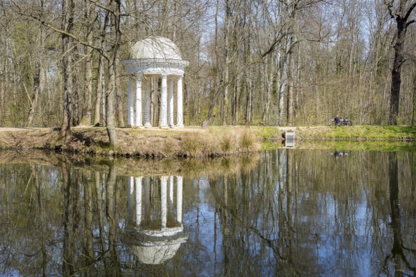 Diana Temple in Lützschena Castle Park with reflection in the water, Leipzig, Saxony, Germany, Europe