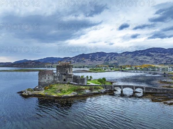 Eilean Donan Castle and Loch Duich from a drone, Isle of Skye, Highlands, Scotland, England, United Kingdom, Europe