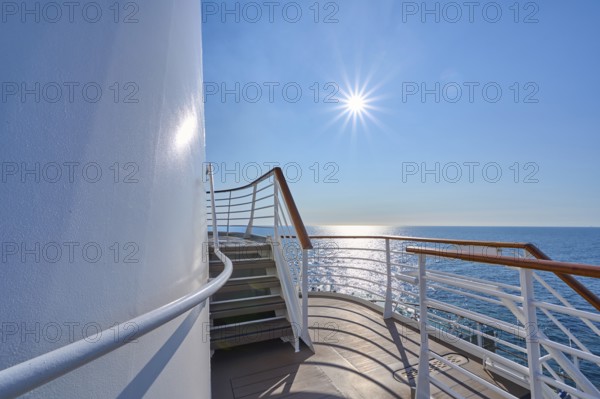 View from the deck of a cruise ship Mein Schiff 6 to the sunny sea and clear sky, North Sea, Norway, Europe