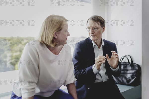 (L-R) Lisa Paus (Alliance 90/The Greens), Federal Minister for Family Affairs, Senior Citizens, Women and Youth, and Karl Lauterbach (SPD), Federal Minister of Health, recorded during the weekly cabinet meeting in Berlin, 21/08/2024