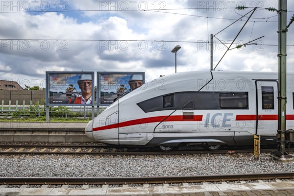 We are starting the general refurbishment. The railway wants to invest massively in tracks and infrastructure. Railway advertising posters with ICE trains at Zuffenhausen station, Stuttgart, Baden-Württemberg, Germany, Europe