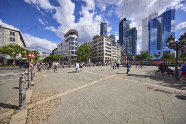 Modern buildings with skyscrapers under a blue sky and cumulus clouds at Opernplatz in Frankfurt am Main, district-free city, Hesse, Germany, Europe