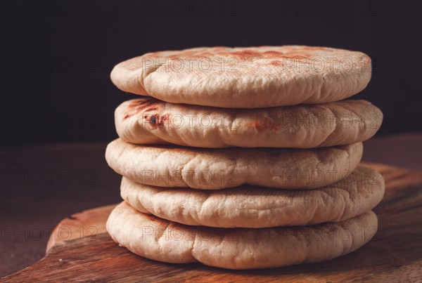 Pita bread, stack, on the table, no people