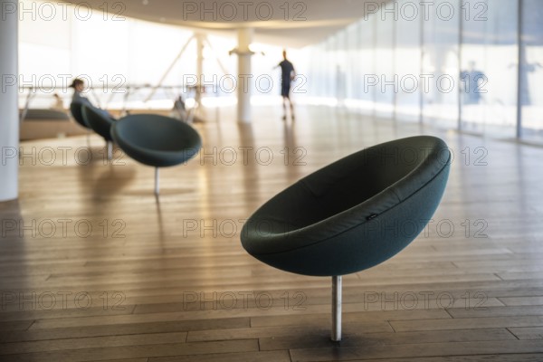 Reading chair, upper floor, Oodi Central Library and Cultural Centre, design by ALA Architects, Helsinki, Finland, Europe