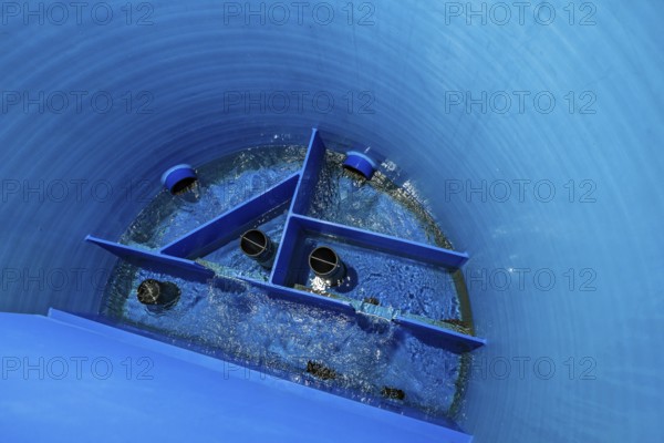 Interior view of a large, blue water tank with geometric structures, ENCW Netze Calw waterworks, Calw, Black Forest, Germany, Europe