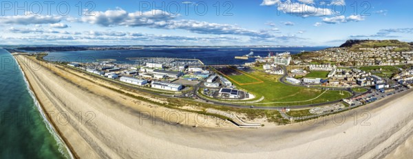 Panorama of Chesil Beach from a drone, West Bay to Portland, Jurassic Coast, Dorset, England, United Kingdom, Europe