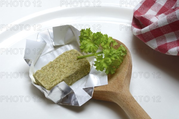 Stock cube with cooking spoon, soup cube