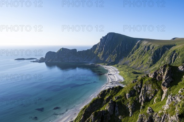 View of coastal landscape, cliffs with peak Måtind or Måtinden, Høyvika beach and sea, hike to the peak of Måtind, Andøya island, Vesterålen, Nordland, Norway, Europe