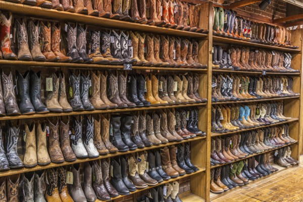 Large variety of cowboy boots for sale at boot store in downtown Nashville, Tennessee, USA, North America