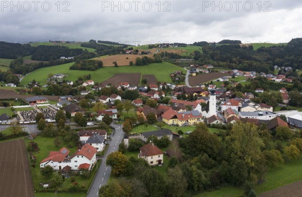 Drone shot, view of village with church, Enzenkirchen, Innviertel, Upper Austria, Austria, Europe