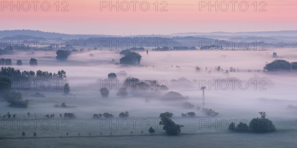 View from the Teufelsmauer (Devil's Wall) into the Harz foothills, landscape with trees and fields in fog and at dawn, Teufelsmauer nature reserve, near Blankenburg, Harz, Saxony-Anhalt, Germany, Europe