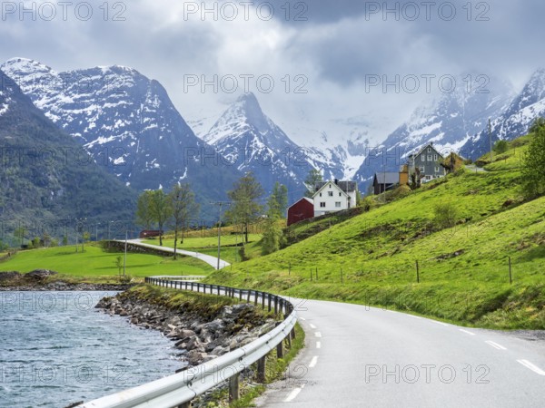 Road along lake Oldevatn to valley Briksdalen and glacier Briksdalsbreen, Norway, Europe