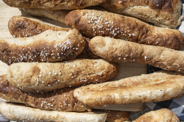 Freshly baked bread, breadsticks, souls with salt and caraway seeds, traditional pastries from Swabia, full-size, Baden-Württemberg, Germany, Europe