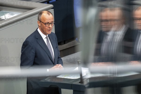 Berlin, Germany - 18 March 2025: Friedrich Merz, CDU Chairman and Chancellor-designate, speaks in the Bundestag in front of the vote on reforming the debt brake to allow hundreds of billions of euros to be borrowed for defence, infrastructure and climate protection, which requires a two-thirds majority of MPs to amend the Basic Law. The SPD and CDU/CSU had introduced the bill to amend the Basic Law in special sessions in the old Bundestag and put it to the vote due to different majorities in the new Bundestag, which will be constituted next week