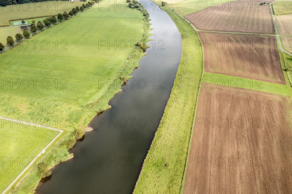 Aerial view over fields and meadows at the Weser river, east of village Wahmbeck, Weserbergland, Germany, Europe