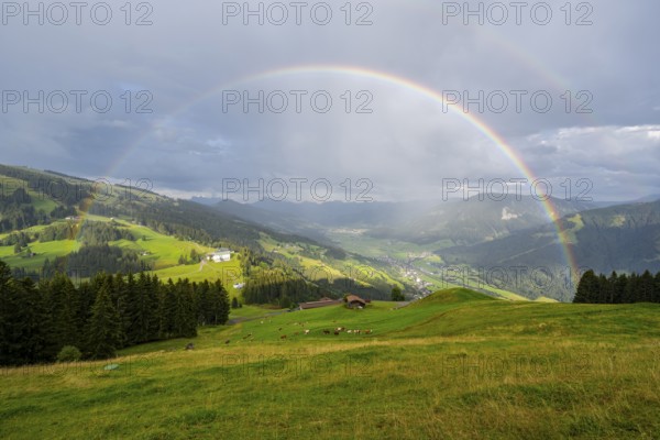 View over the Brixen Valley with rainbow, Hochbrixen, Brixen im Thale, Kitzbühel Alps, Tyrol, Austria, Europe