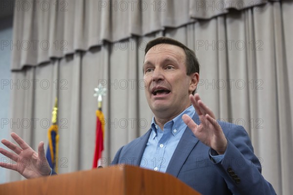 Warren, Michigan USA - 29 March 2025 - The Michigan Democratic Party hosted a 'People's Town Hall.' An overflow crowd at a UAW hall listened to Sen. Chris Murphy (D-Conn). Speakers targeted Representative John James, a Republican who represents the Macomb County district where the event was held, for refusing to meet with his constituents