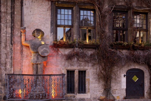 Illuminated Roland statue at the town hall at dusk, Quedlinburg, Saxony-Anhalt, Germany, Europe