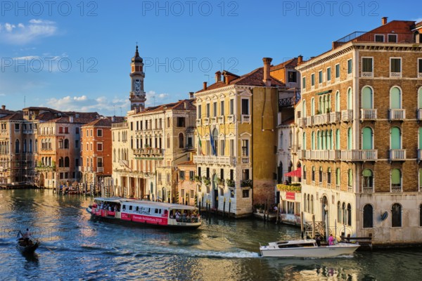 VENICE, ITALY, JUNE 27, 2018: Grand Canal with boats, vaporetto and gondolas on sunset from Rialto bridge, Venice, Italy, Europe