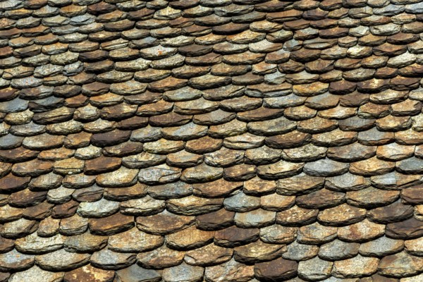 Traditional slate roof (lauze stone) in Auvergne volcanoes regional natural park, Puy de Dome department, Auvergne-Rhone-Alpes, France, Europe