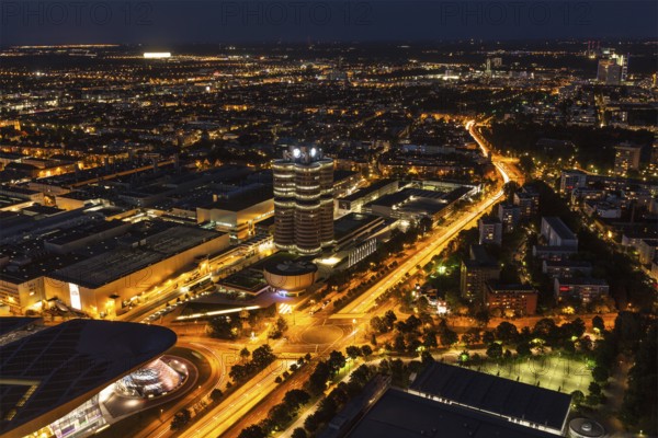 MUNICH, GERMANY, MAY 11: Aerial view of BMW Museum & BWM Welt & factory from Olympic Tower in the evening on May 11, 2012 in Munich, Bavaria, Germany. BMW is famous German luxury car automaker