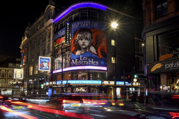 Traffic at night outside the Sondheim Theatre, Les Misérables, Musical, West End, London, England, United Kingdom, Europe