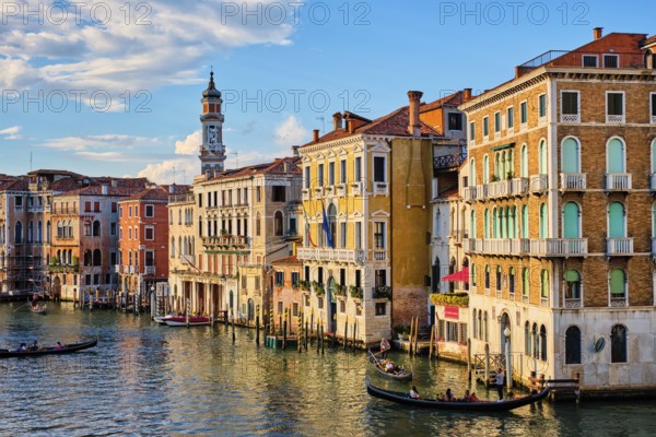 VENICE, ITALY, JUNE 27, 2018: Grand Canal with boats and gondolas on sunset, Venice, Italy, Europe
