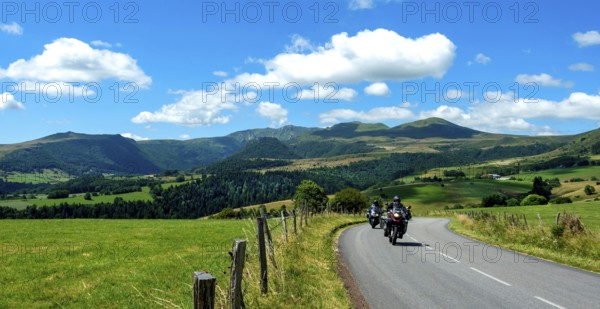 Motorcycle group in Sancy Massif. Auvergne Volcanoes Natural Park. Puy de Dome department. Auvergne Rhone Alpes. France