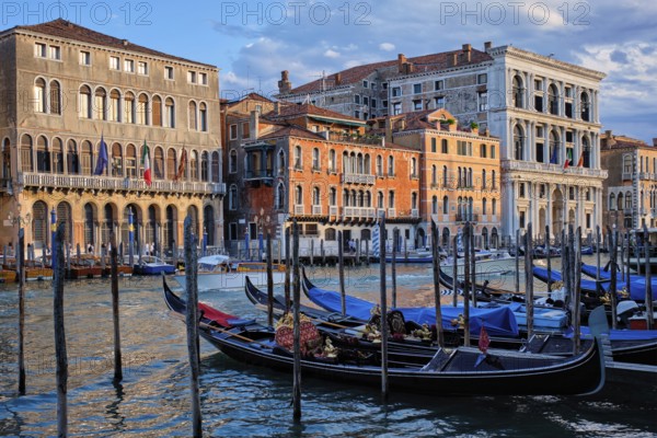 Grand Canal with boats and gondolas on sunset, Venice, Italy, Europe