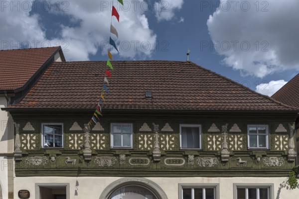 The historic Jörg Hofmann House built in the Renaissance style in 1689, decorative carvings on the upper façade, Zeil am Main, Lower Franconia, Bavaria, Germany, Europe