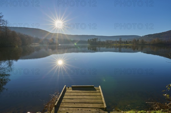 Lake with jetty at sunrise, Freudenberg am Main, Untermain, Spessart, Odenwald, Franconia, Baden-Württemberg, Germany, Europe