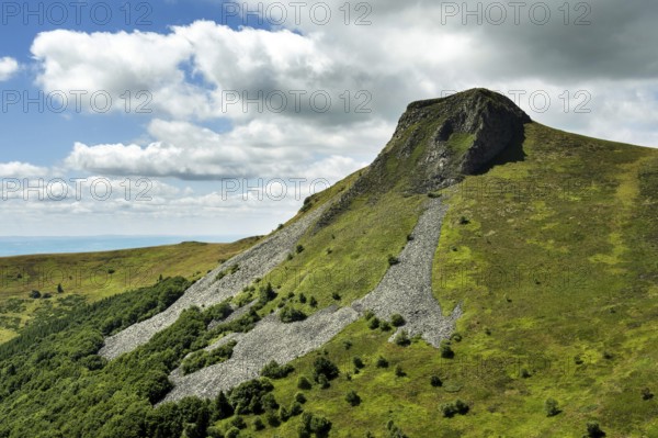 The Banne dOrdanche of volcanic origin culminates at an altitude of 1512m. It overlooks La Bourboule. Auvergne Volcanoes Regional Nature Park. Puy de Dome department. Auvergne Rhone Alpes. France
