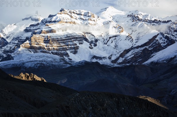 Himalayas snowcapped summit mountains in snow. Near Dhankar, Spiti Valley, Himachal Pradesh, India, Asia
