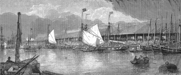 The fish market in the fishing harbour of Yarmouth in 1868, England, Historic, digitally restored reproduction of a 19th century original