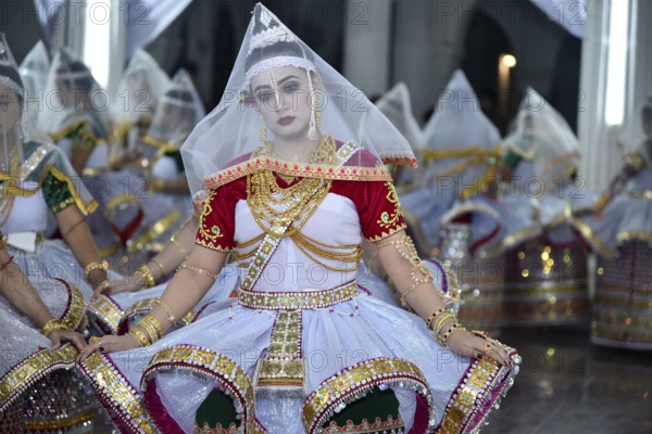 Artistes enacting the role of Gopi as they perform Manipuri Raas Leela Dance in Imphal, Manipur, India on Friday, 23 November, 2018. The Rasa Leela is the famous dance of Manipuri culture invoking deep feelings of people. The dance illustrates an eternal love of Radha and Krishna as been described in the Hindu scriptures and puranas