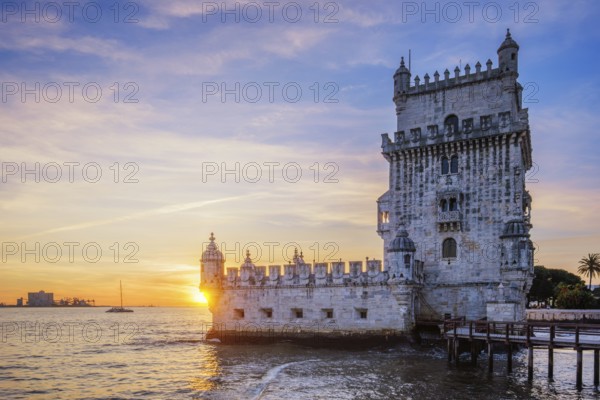 Belem Tower or Tower of St Vincent, famous tourist landmark of Lisboa and tourism attraction, on the bank of the Tagus River Tejo on sunset. Lisbon, Portugal, Europe