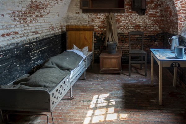 Interior of old jail cell at the prison museum at Merksplas near Hoogstraten, province of Antwerp, Flanders, Belgium, Europe