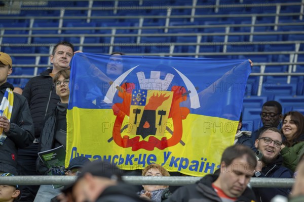 Football UEFA Europa League, 2024/25 season, matchday 2: TSG Hoffenheim v Dynamo Kiev. Picture: Dynamo Kiev fans hold up the Luhansk flag
