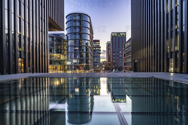 Modern high-rise architecture in the Media Harbour quarter in Düsseldorf at dusk, North Rhine-Westphalia, Germany, Europe
