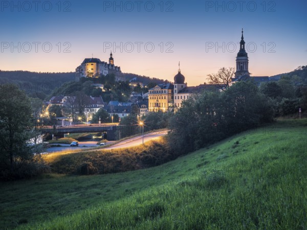Town view with Upper Castle, Lower Castle and St Mary's Church at dusk, Greiz, Thuringia, Germany, Europe