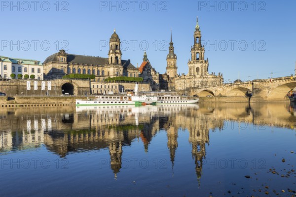 City view with paddle steamer and reflection in the Elbe, Ständehaus, Georgentor, Hausmannsturm, Hofkirche and Augustusbrücke, Dresden, Saxony, Germany, Europe