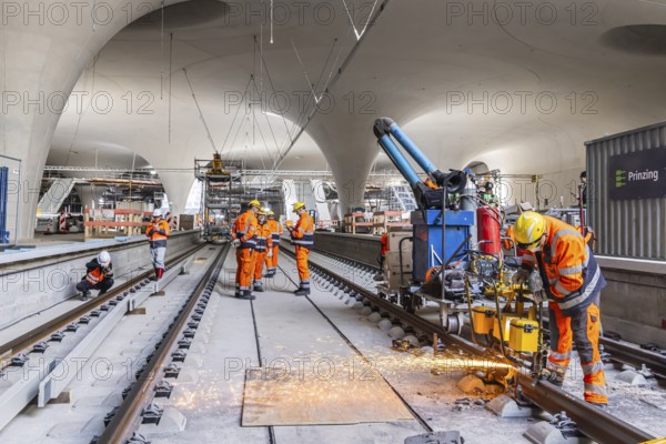 The last rails are being welded at the new main station. All the rails are now in place between Feuerbach and Wendlingen. The last gaps between the rails have been closed using the Thermit welding process. The infrastructure project is scheduled to go online at the end of 2026. Deutsche Bahn estimates the total cost of Stuttgart 21 at around eleven billion euros. Stuttgart, Baden-Württemberg, Germany, Europe