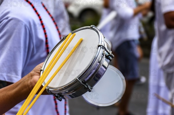 Tambourine player on the streets of Brazil during Carnival, Brazil, South America