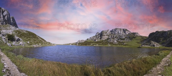 Panoramic of the beautiful lake of Covadonga in Asturias, a beautiful spring sunset, Picos de Europa. Spain