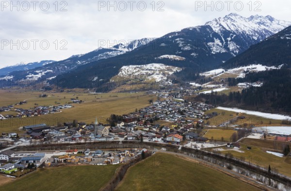 Drone image, residential buildings, view of village with parish church, Niedernsill, Salzach, Pinzgau, Salzburg province, Austria, Europe