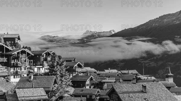 Roofs covered with hoarfrost, fog rising, black and white photo, Grimentz, Val d'Anniviers, Valais Alps, Canton Valais, Switzerland, Europe