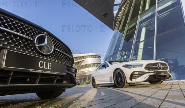 New Mercedes cars at the Stuttgart branch, with the Mercedes Museum behind it. Stuttgart, Baden-Württemberg, Germany, Europe