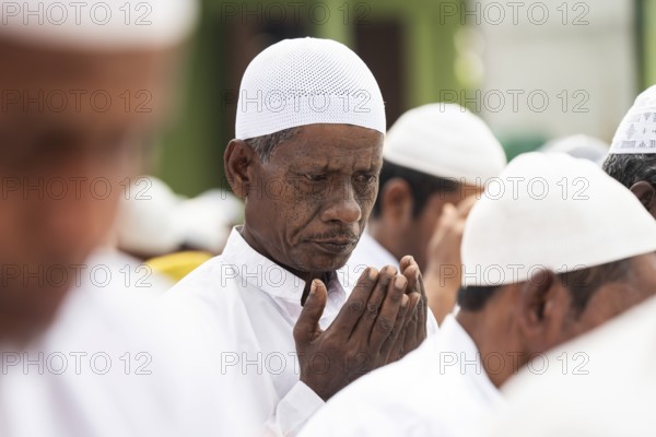 KAYAKUCHI, INDIA - MARCH 31: Muslims perform Eid al-Fitr prayer at Eidgah in Kayakuchi, India on March 31, 2025. Muslims around the world are celebrating the Eid al-Fitr holiday, which marks the end of the fasting month of Ramadan