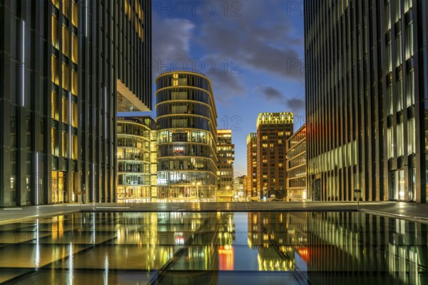 Modern high-rise architecture in the Media Harbour quarter in Düsseldorf at dusk, North Rhine-Westphalia, Germany, Europe