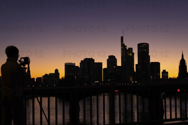 The silhouette of Frankfurt's banking skyline stands out in the evening against the residual light of the setting sun, Frankfurt am Main, Hesse, Germany, Europe